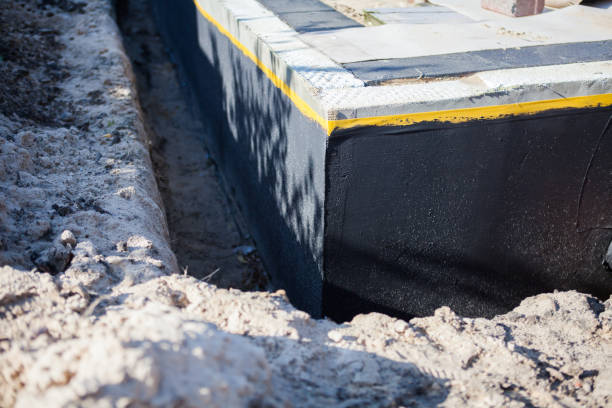 Professional Waterproofing technician working in Linden, NJ